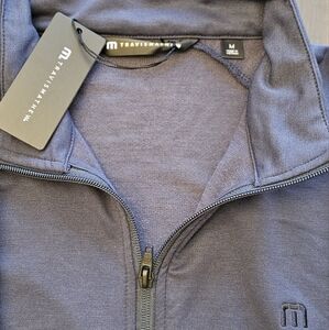 Travis Matthew's Blue 3/4 zip knit long sleeve
